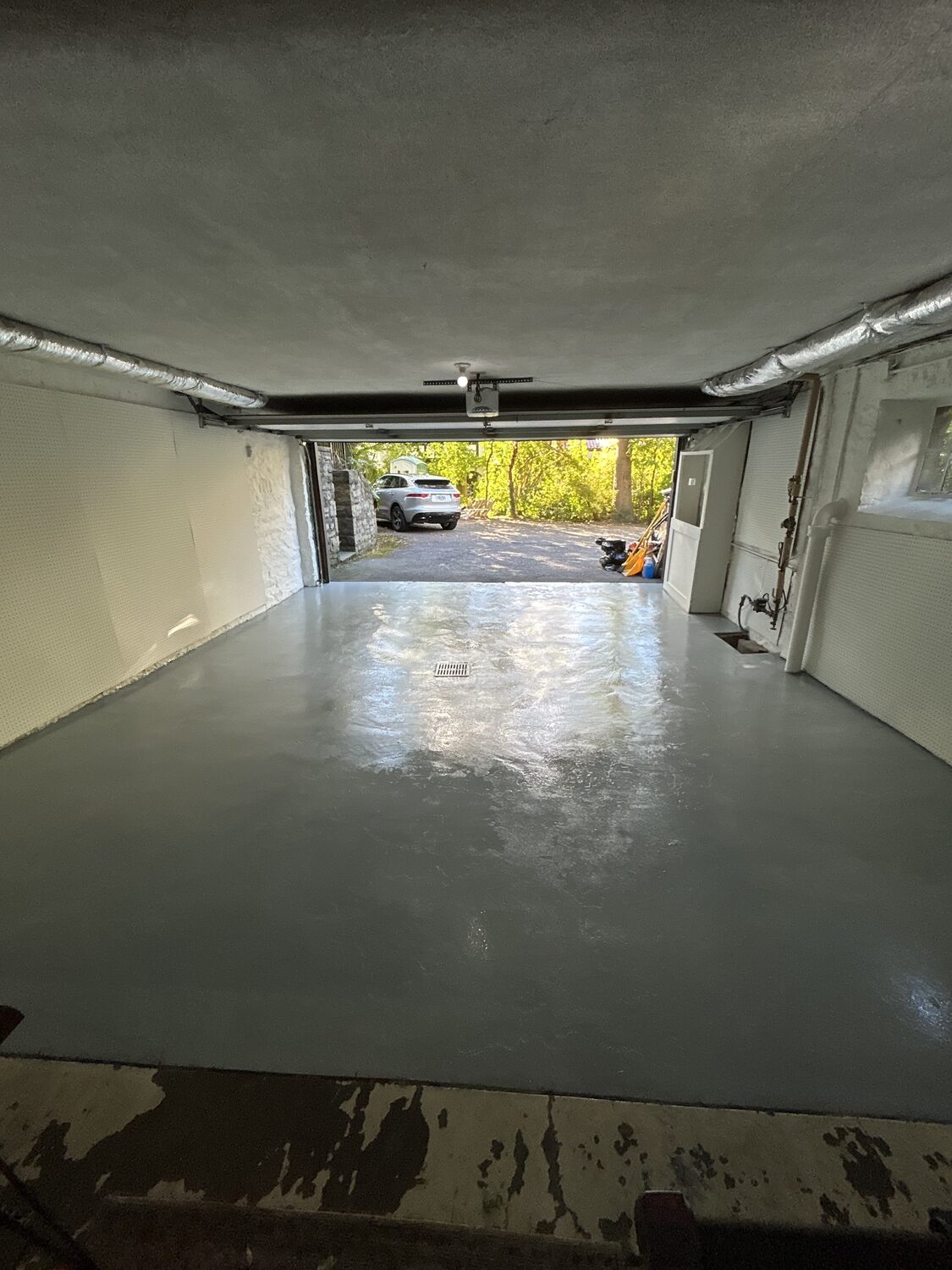 Garage floor stripped and refinished smooth